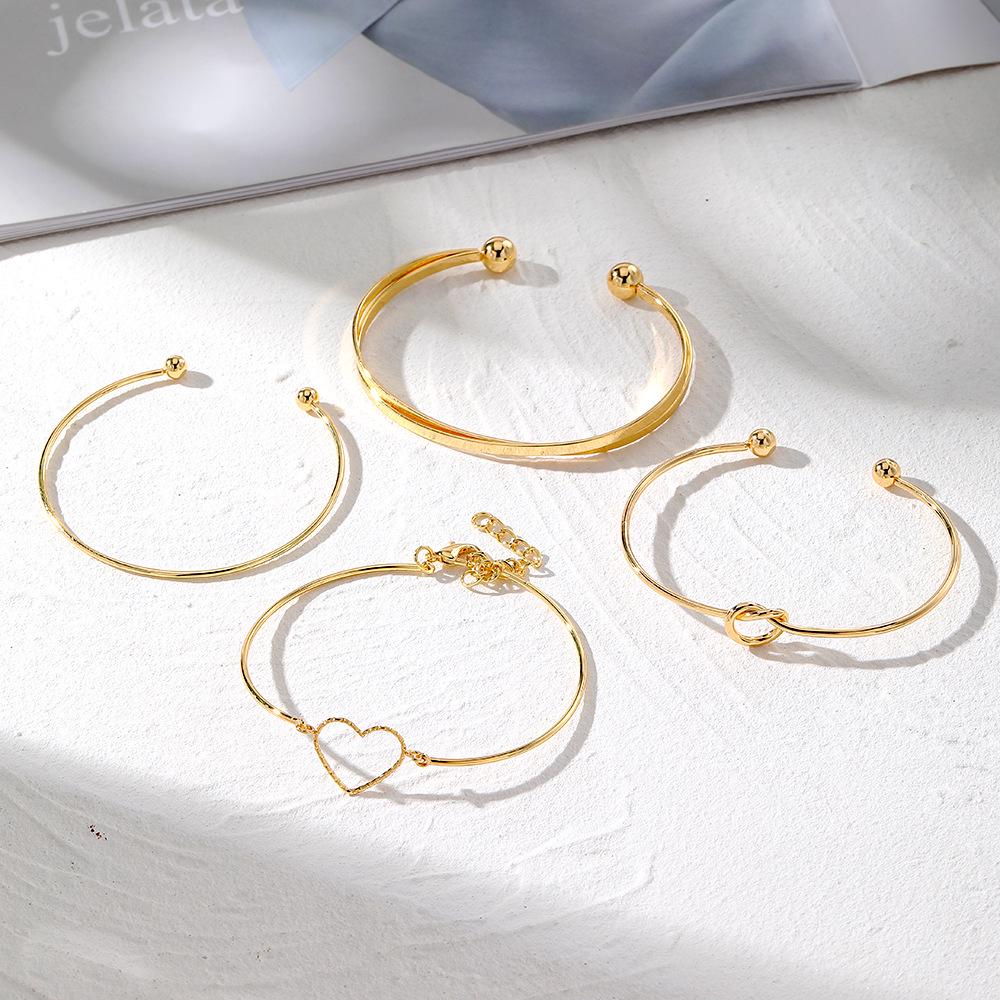 European & American Love Knot Alloy Bracelet Set: 4-Piece Creative Geometric Heart Design