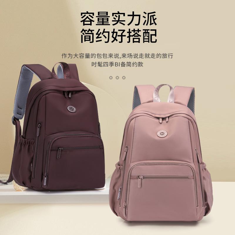 Schoolbag backpack women's 1011 new large-capacity computer bag multi-pocket college student schoolbag can be set with tie rod travel backpack