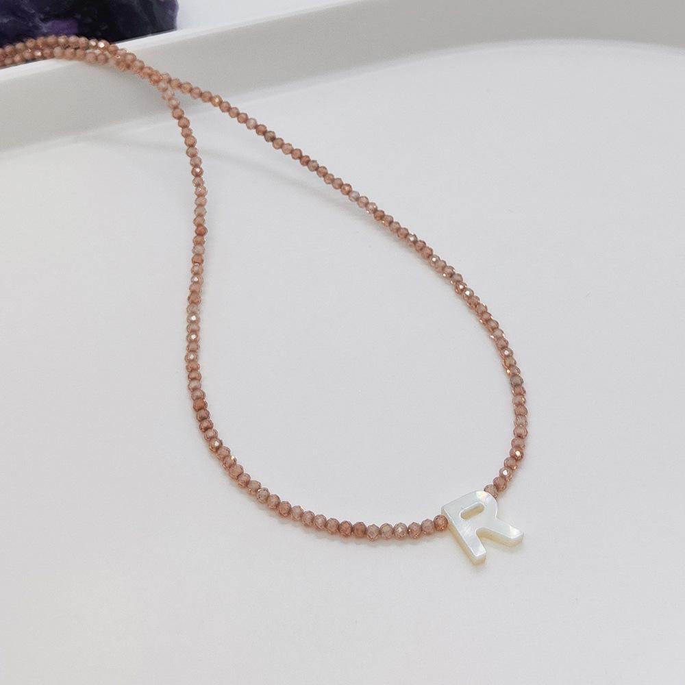Elegant 2m Zircon Beaded Clavicle Chain: 26-Letter Deep Sea Shell Necklace for Women.