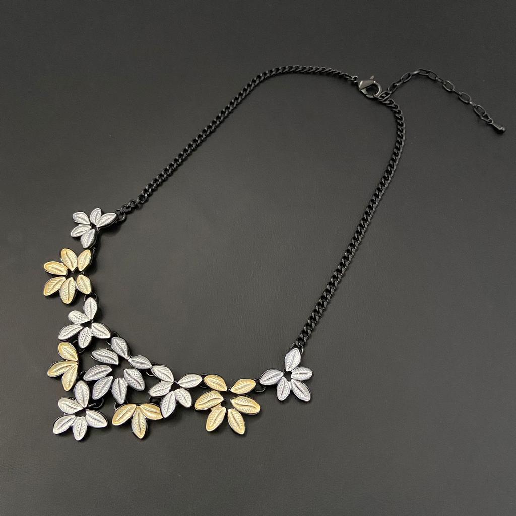 Pendentif long fleur géométrique creuse couleur émail, pendentif collier polyvalent en forme de cœur pour femme à sens élevé