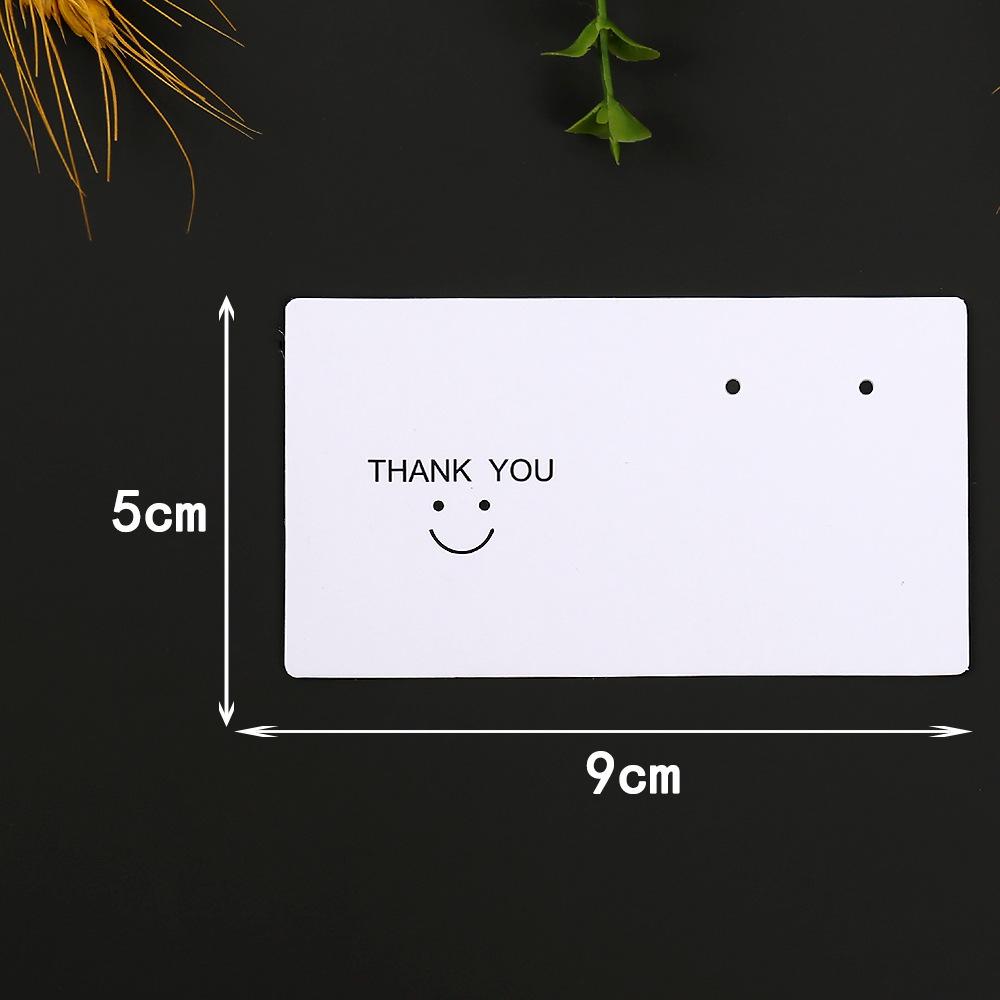 Earring Display Card with Smiley Face Design - High-End, Minimalist Packaging for Ear Ornaments