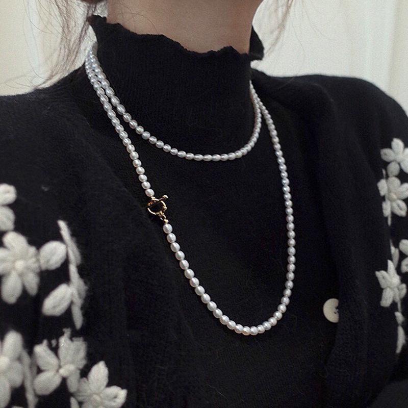 Light luxury retro natural freshwater pearl necklace women's niche high-end sense antique long millet bead sweater chain spring and autumn