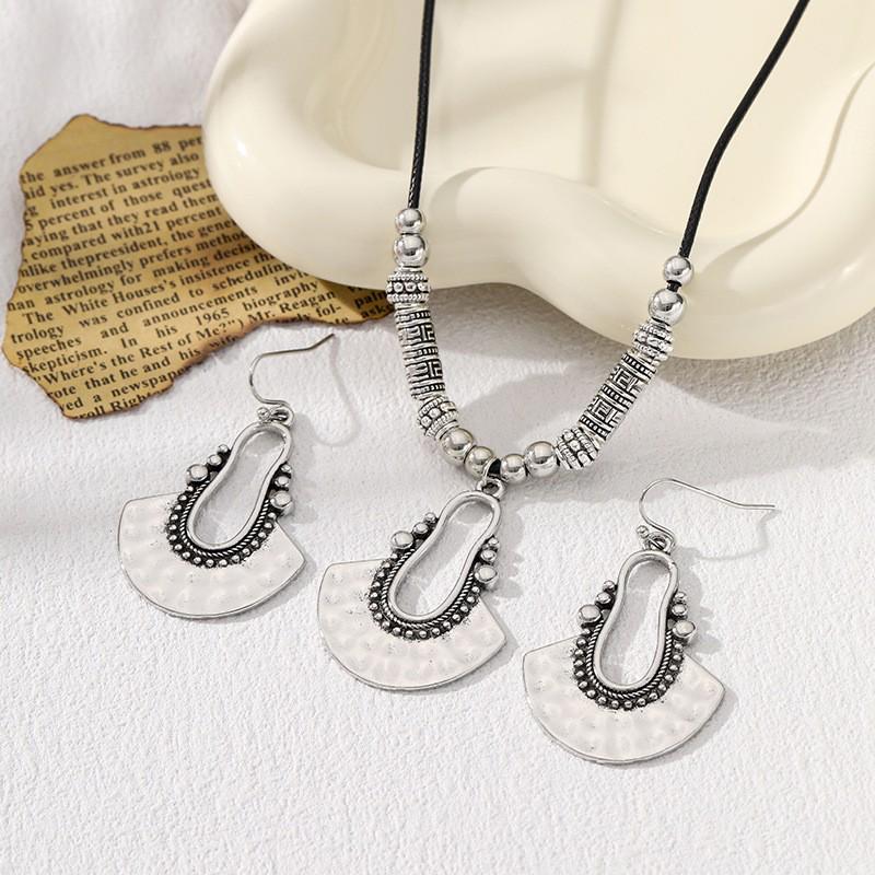 Bohemian Retro Fan-shaped Earring and Necklace Set: Fashionable Hollow-out Vacation Style for Women
