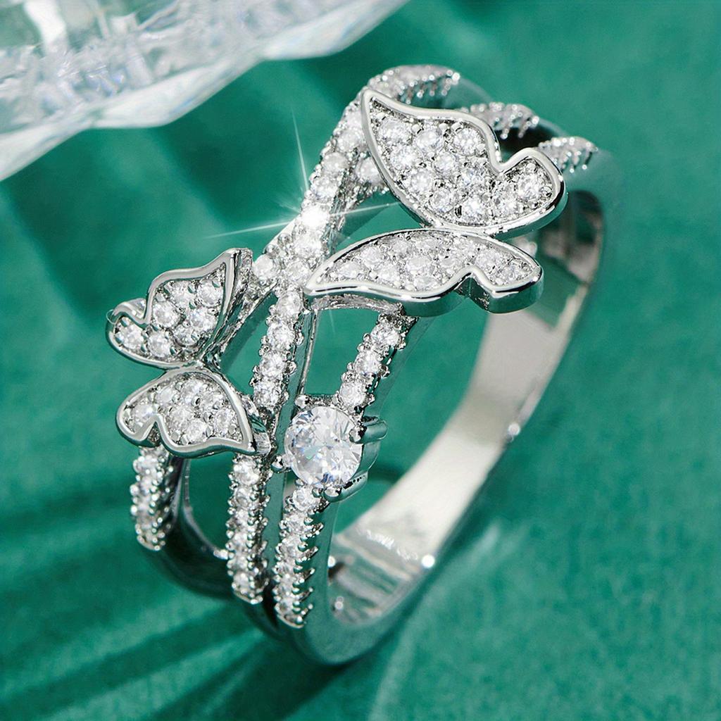 Sterling Silver Ring Features a Multi-layered Design, with a Cute Butterfly Embedded On the Band, Adorned with Sparkling Artificial Zirconia