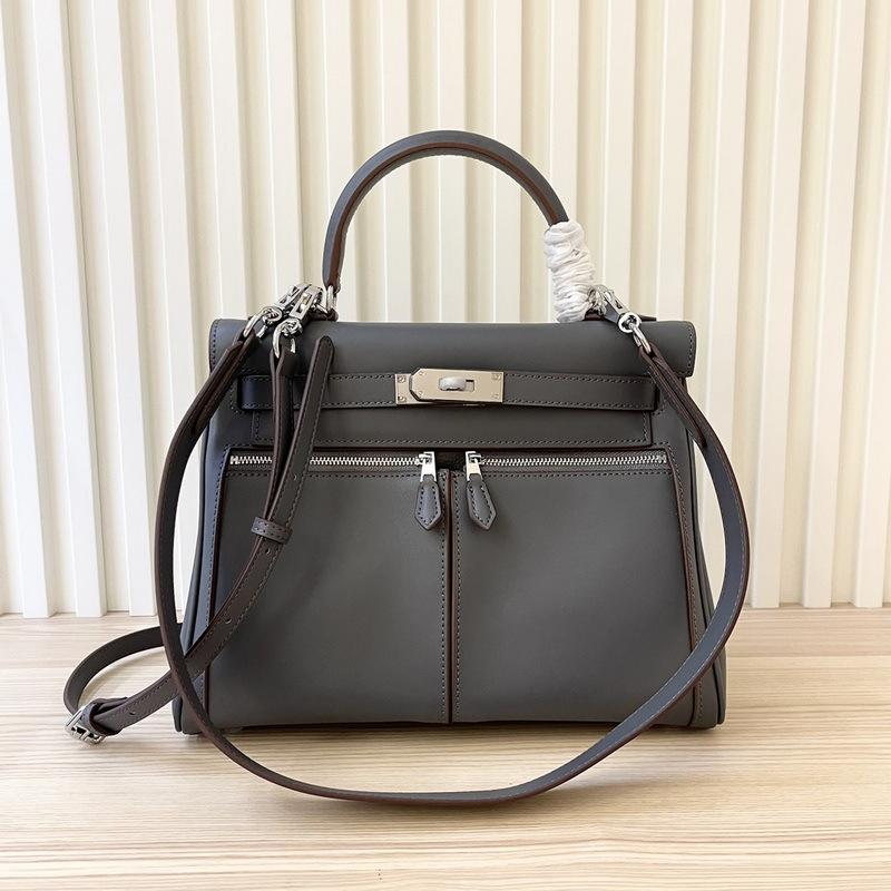 2025 New Leather Swift Leather Women's Bag Double Pocket Zipper Portable Shoulder Diagonal Span Fashion Buckle Women's Bag