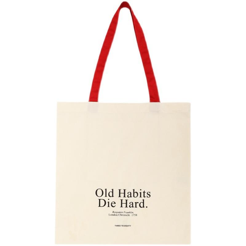 

Простая холщовая сумка через плечо большой вместимости с надписями