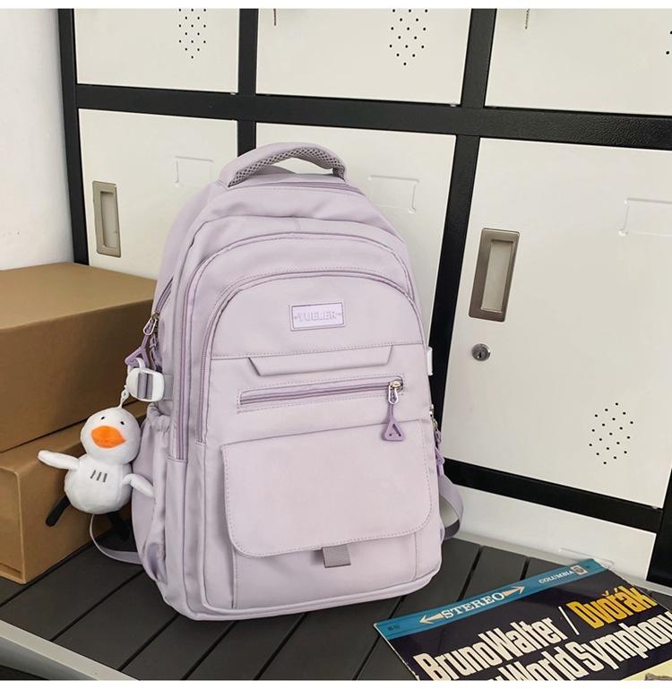 Schoolbag high-value simple casual couple travel backpack large capacity junior high school students multi-compartment backpack men