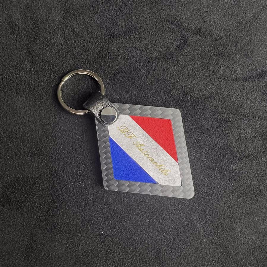 

Mercedes-AMG Style Suede Carbon Fiber Keychain with Italian, German, and French Flags