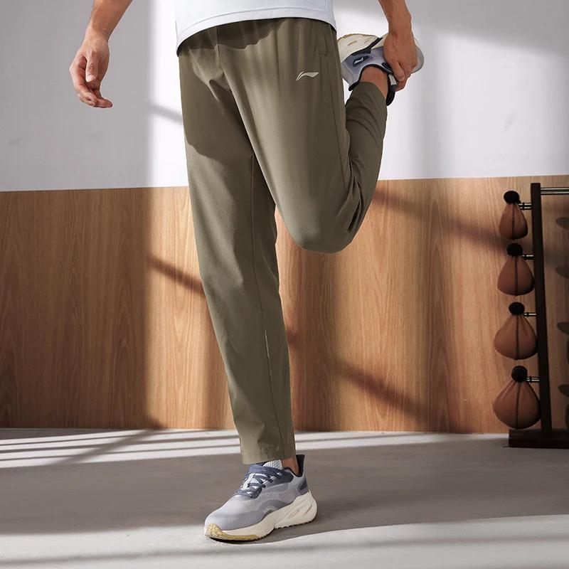 Li-Ning Fitness Series Solid Color Logo Elastic Waist Straight Leg Quick Dry Knitted Sports Pants Men pants Military-Green AYKT205-3