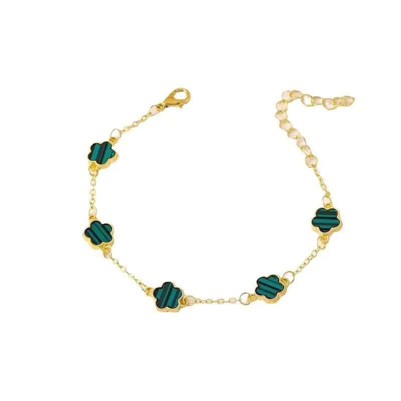 Koreaanse Stijl 4-delige Sieradenset: Bloemenarmband, Ring, Oorbellen met Stud & Klavertje Vier Ketting