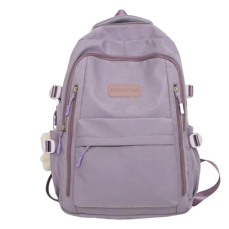 Schoolbag spot wholesale backpack male junior high school student trend large capacity schoolbag female high school student 1011 new