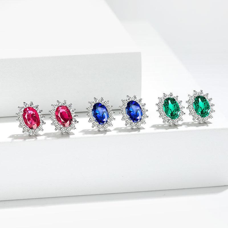 Zodiac Stone Gemstone Stud Earrings: Exaggerated Royal Blue Sapphire Sunflower Design In European and American Style.