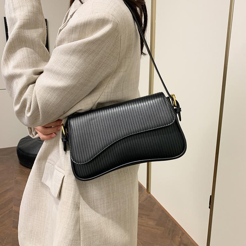 Trendy Simple Personality Versatile Solid Color Bag Women's Bag Winter New High Texture Striped Shoulder Armpit Bag