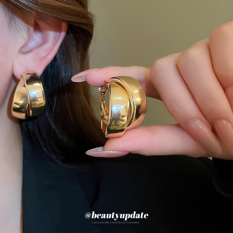 Double-Layer Criss-Cross Metal Hoop Earrings: Fashionable European & American Design with a Simple, Elegant Style.