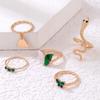 Set mit 5 goldenen Ringen im Retro-Punk-Vintage-Stil mit Schlangen- und Schmetterlingsmotiven (grün)