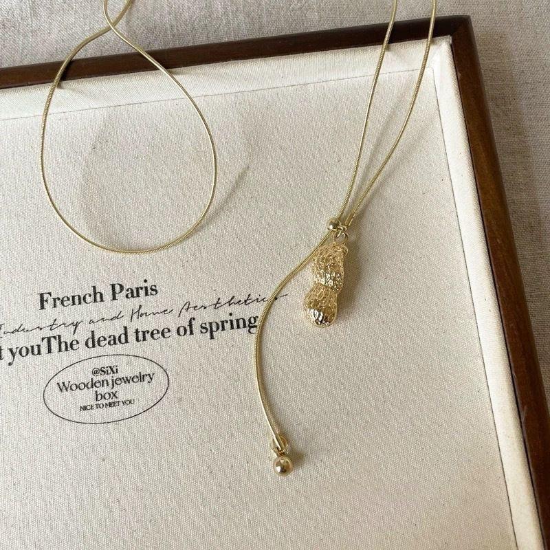 

Women s Autumn and Winter Neck Hanging Long Sweater Necklace золотий