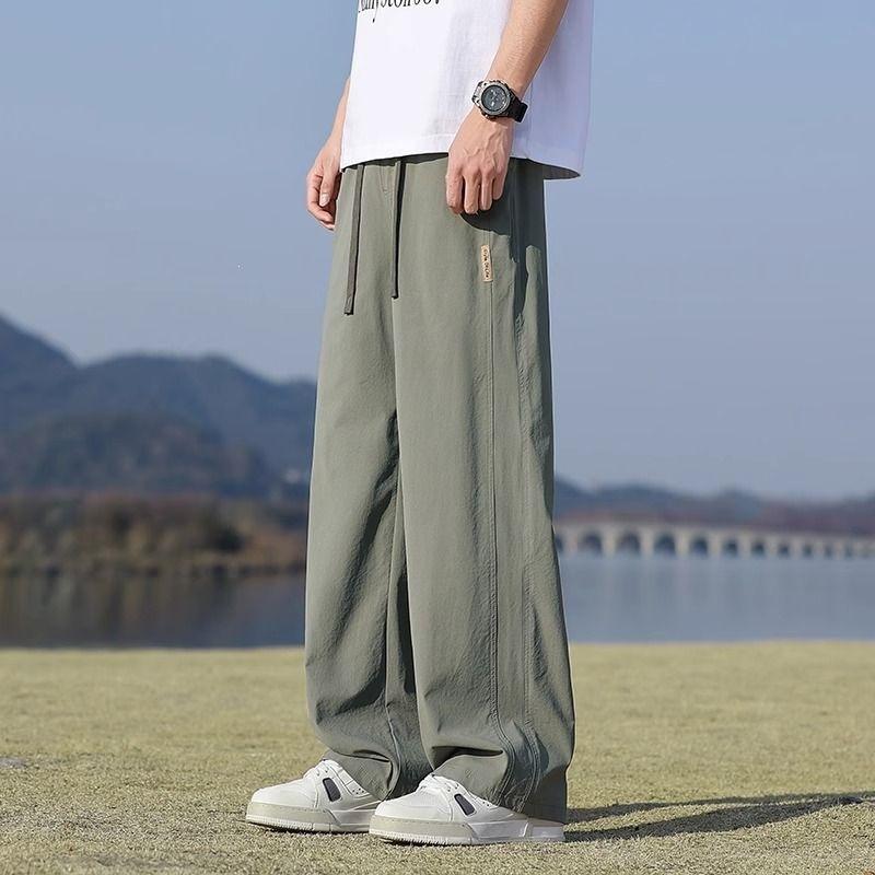 Men s pants summer new ice silk thin loose straight casual pants M зелёный