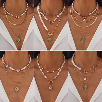 Collier à chaîne os de serpent perlé style ethnique Collier avec pendentif tournesol rétro œil turquoise