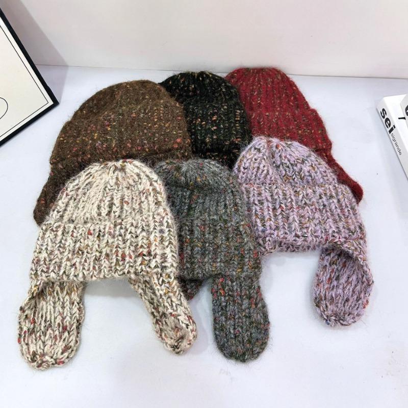 New snowflake point flanged wool hat women's autumn and winter warm knitted hat vertical strip bag head cold hat tide