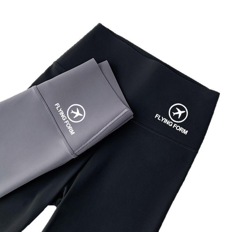 Spring and Autumn women wear thin legs, strong pressure, abdomen and buttocks, yoga women, shark skin, airplane leggings, Barbie pants