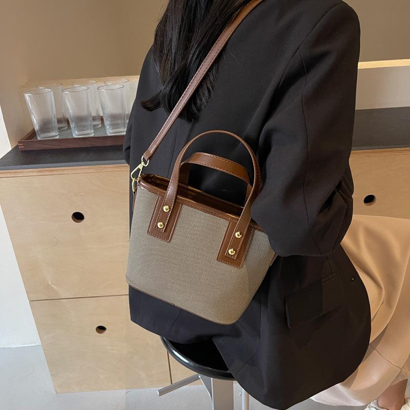 Autumn new fashionable and simple contrasting color vegetable basket bag portable shoulder oblique span trendy women's bag