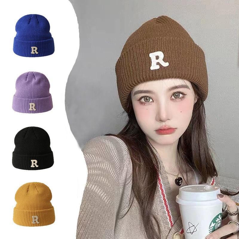 Hat winter female high-value round face student versatile cold-proof warm face small knitted wool hat