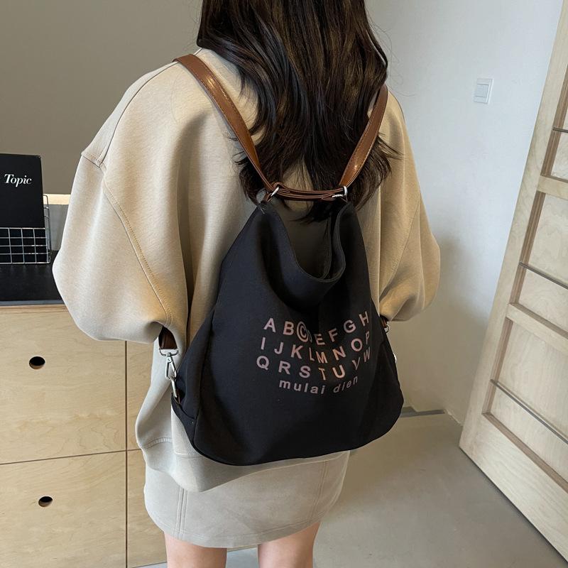 Autumn new canvas large-capacity bag women's 2025 fashion messenger bag fashion texture commuter shoulder tote bag