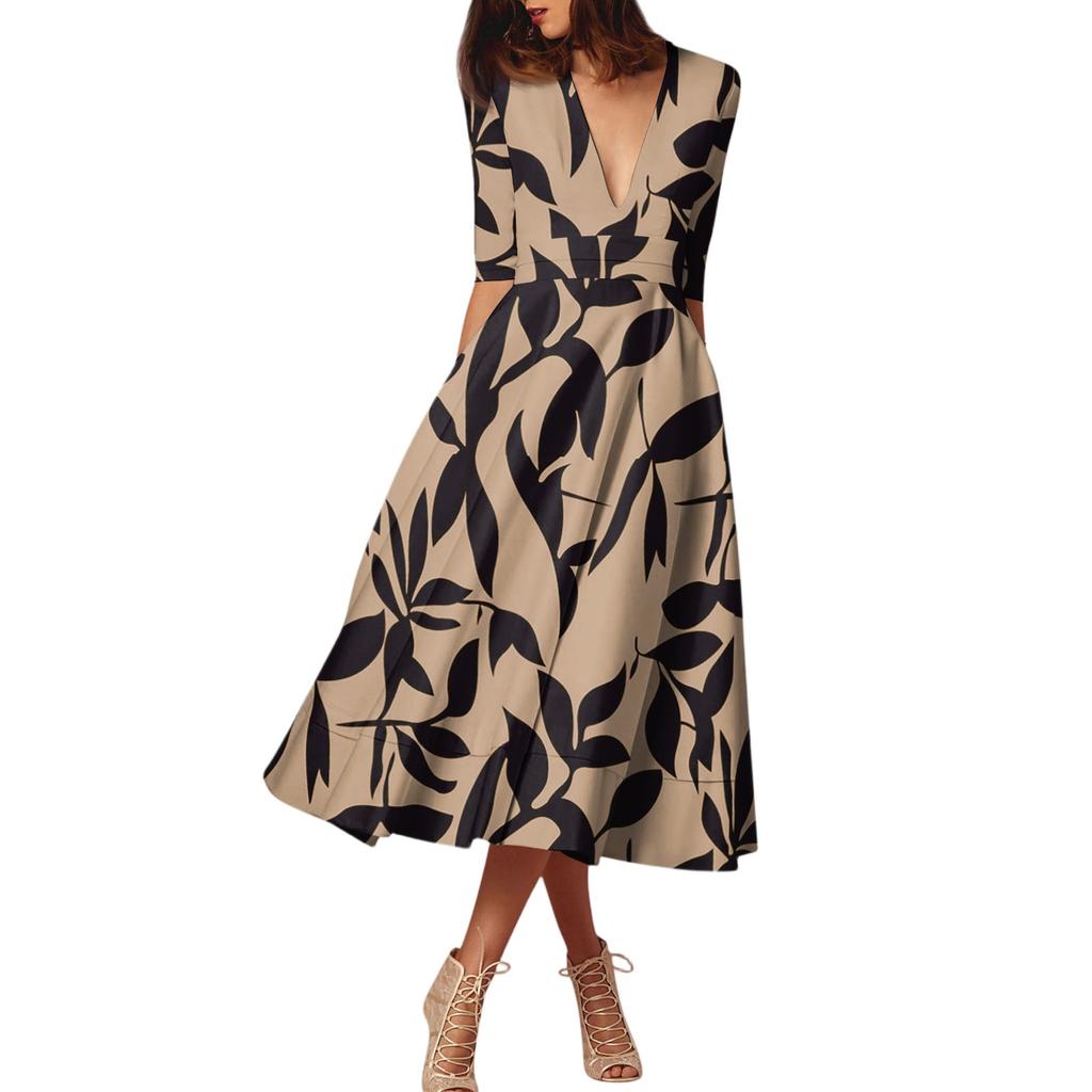 Ein modisches, mittellanges Kleid mit halblangen Ärmeln, floralen Prints und einem sexy V-Ausschnitt.