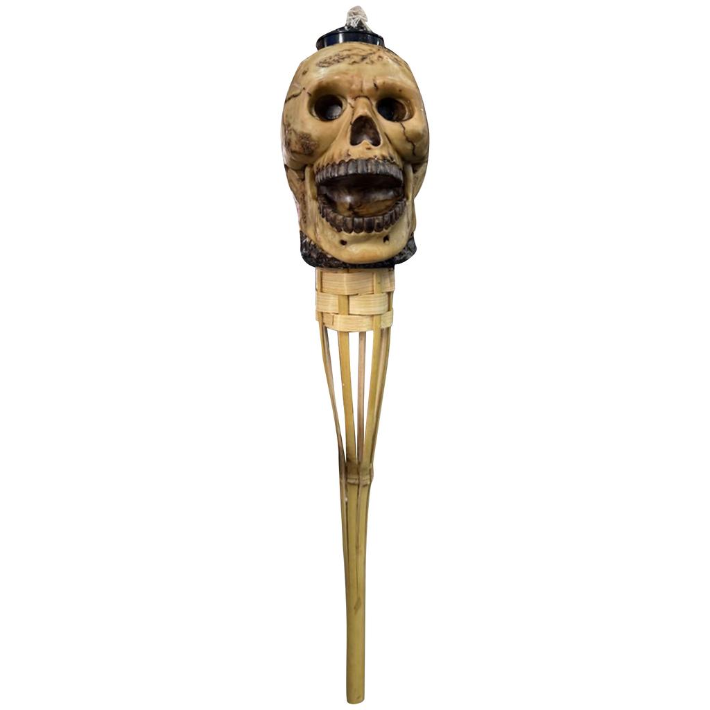 Highlighting A Macabre Head, This Torch Doubles As Eerie Decor And A Fire - Breathing Centerpiece. It With To Ignite, Casting Flickering Shad