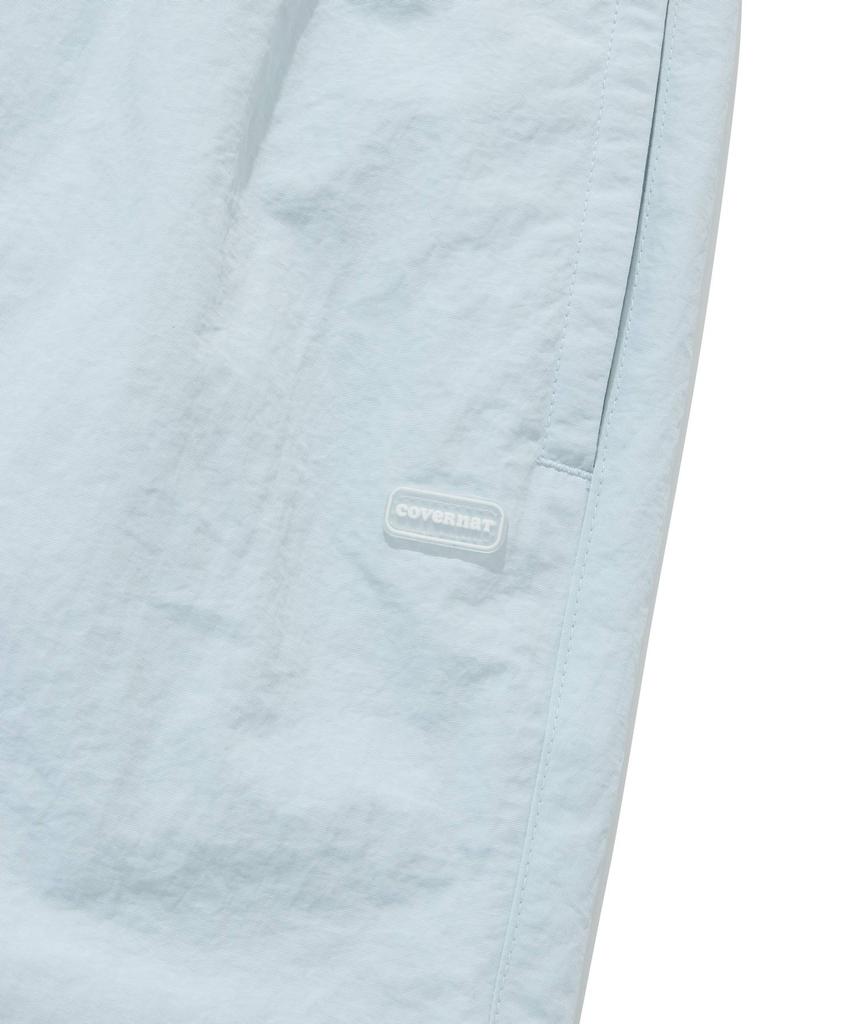 COVERNAT WOMAN Sheer Nylon Windbreaker Shorts Light Blue