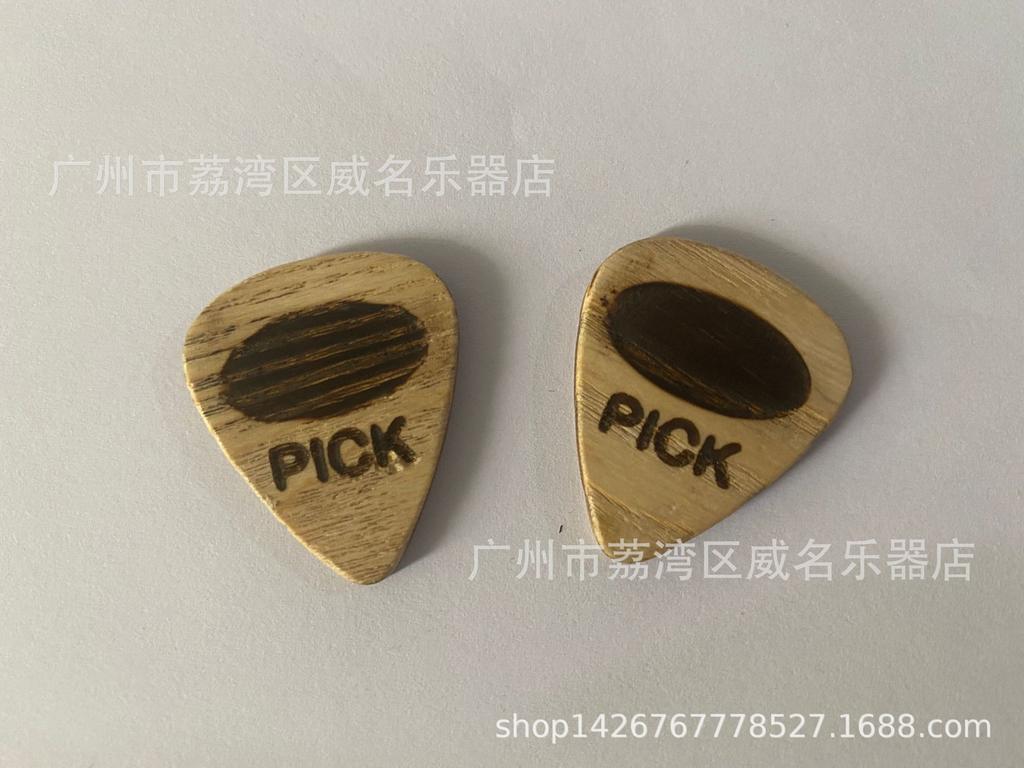 Electric and Wooden Guitar Picks: Thumb, Index, and Acoustic Options