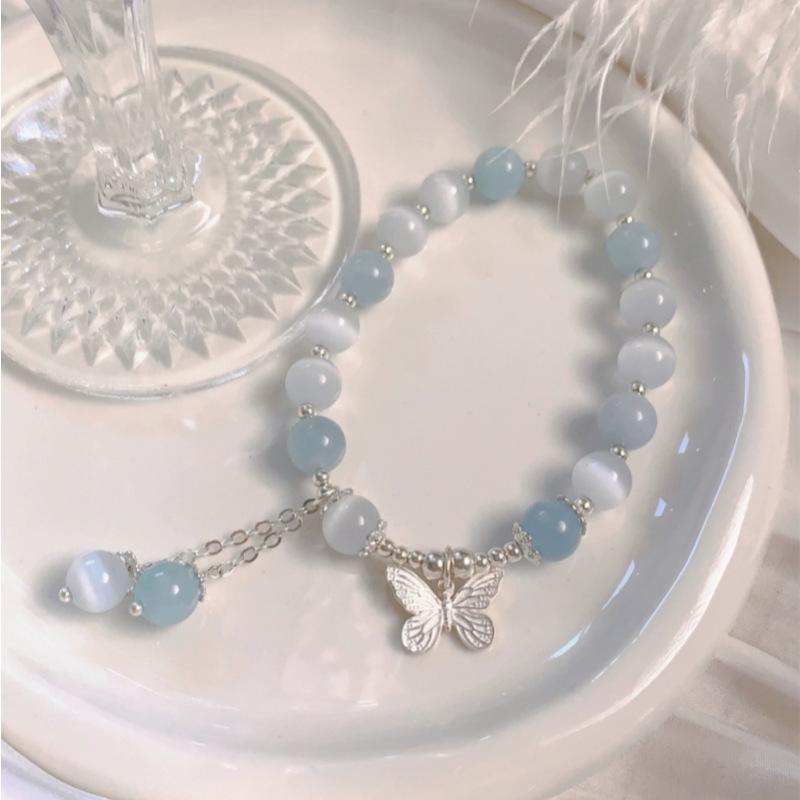 

Aquamarine Cat s Eye Crystal Butterfly Bracelet with Sterling Silver and Tassel