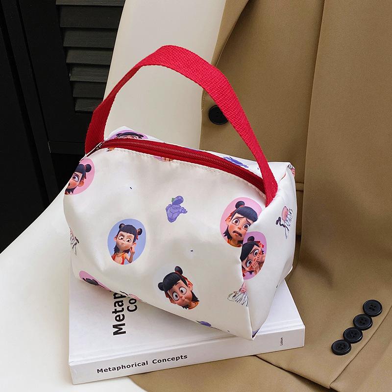 

Women s cosmetic bag portable storage wash three-dimensional cute handbag cartoon Nezha printing handbag one size fits all красный