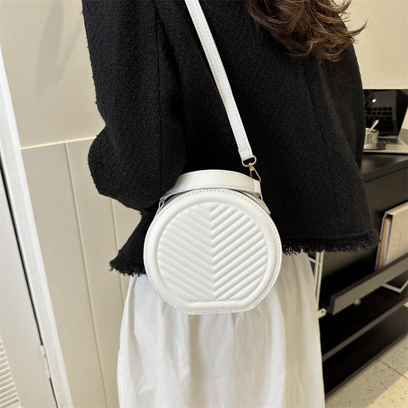 Einfache einfarbige kleine Tasche Damen 2025 Herbst und Winter neue Schulter-Umhängetasche Textur kleine runde Tasche Tide