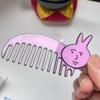A Useless Gift for a Friend, a Mini Hair Comb.
