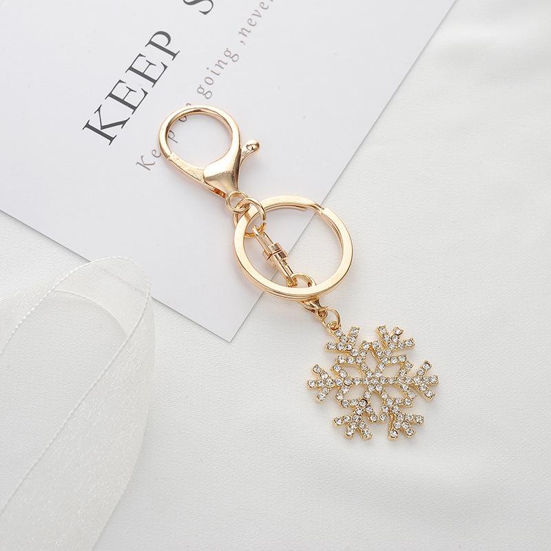 Christmas Snowflake Metal Keychain Set: Exquisite Small Hollow Gold Pendants