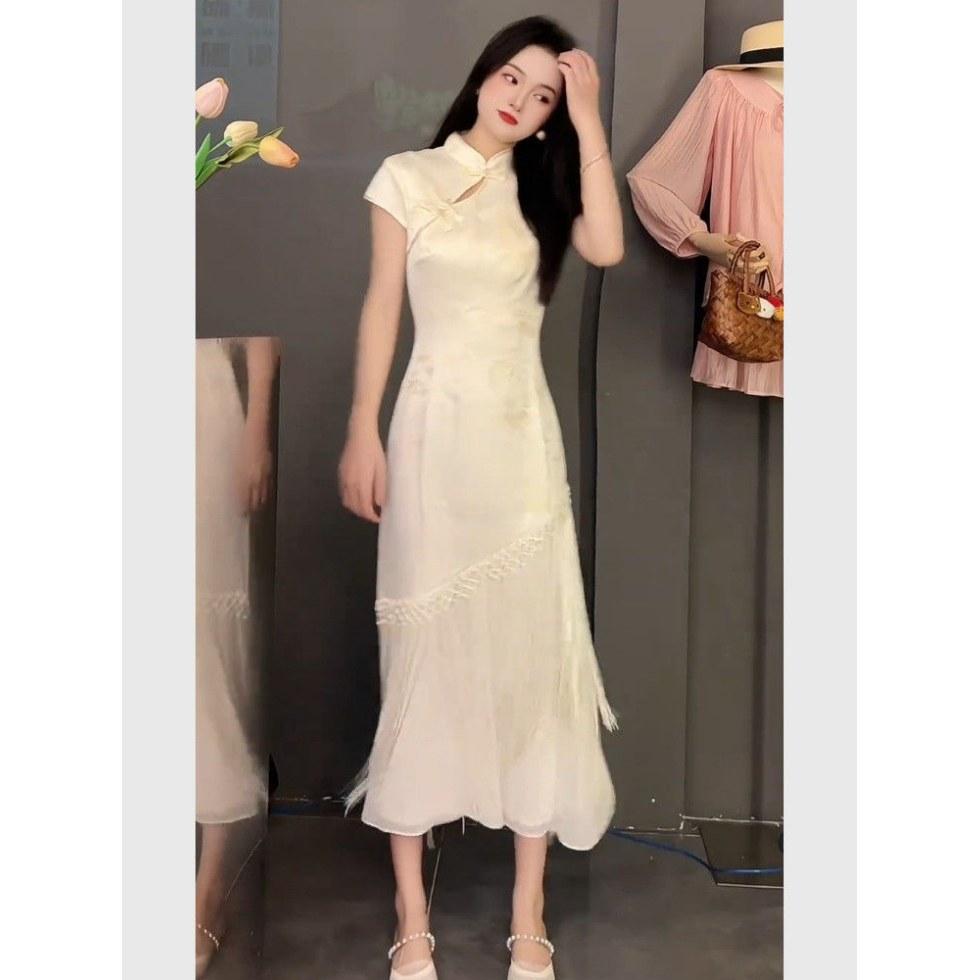 Nuova gonna cheongsam in stile cinese, nuovo temperamento unico e bello, abito beige di alta gamma con vita a intarsio