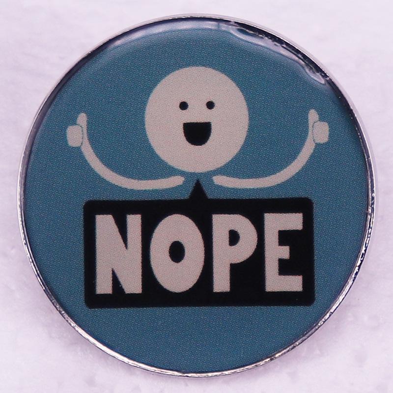 

NOPE Brooch Badge
