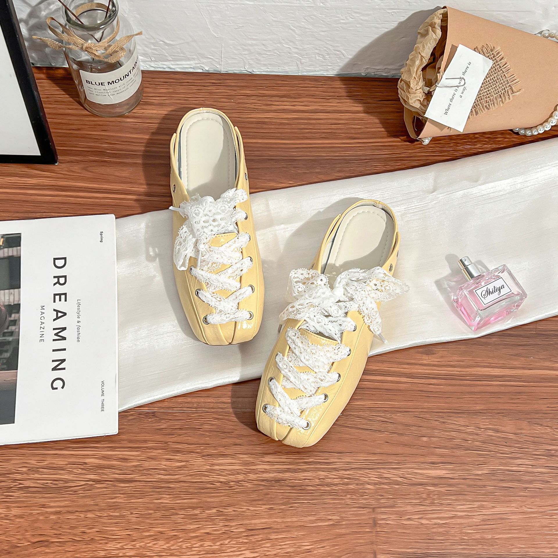 

Autumn new retro single shoes women s back empty high-end sense niche design sense front lace-up bag head Muller shoes women 2025 35