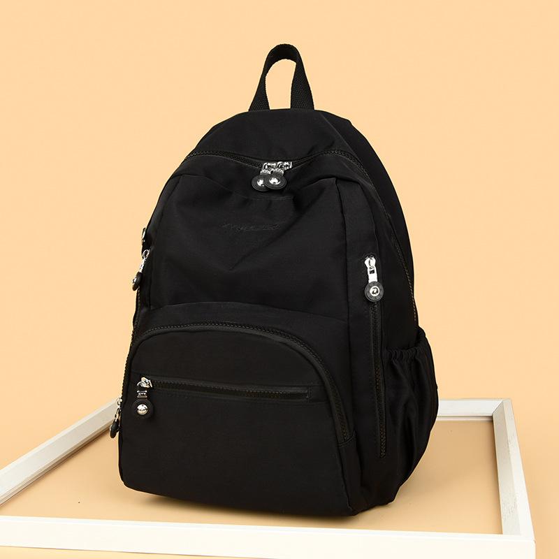 Damen Leichter Wasserdichter Rucksack Nylon Rucksack mit großem Fassungsvermögen Pendler Studentenrucksack Schultasche