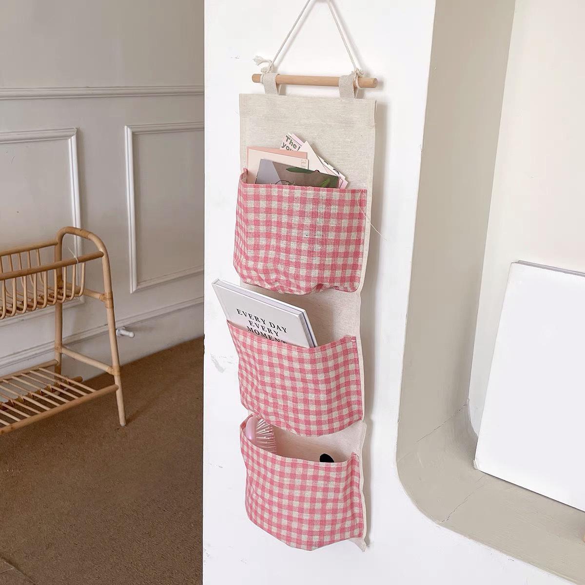 

1pc Wall Mounted Storage Bag with Flip Cover - Suitable for Bedrooms, Compatible with Books, Jewelry, and Small Accessories