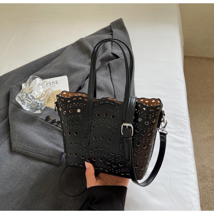 High-end carved hollow portable small bag women's 2025 new fashion texture bucket bag single shoulder messenger bag tide