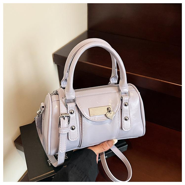 

Niche high-end handbag women s 2025 new fashion versatile simple messenger pillow bag фіолетовий