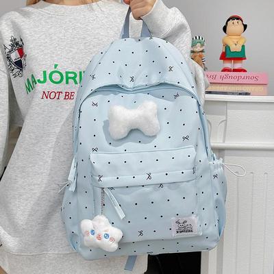 Polka Dot Bow Backpack for Teen Girls: Stylish and Versatile Schoolbag for Middle and High School Students.