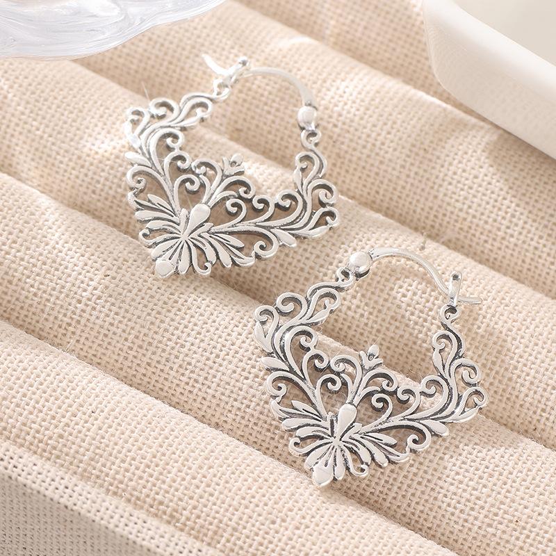 Earrings European and American hollow retro court personality Internet celebrity copper earrings