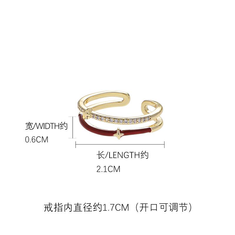 Four-pointed star hollow ring, women s New Year s zircon index finger ring, light luxury wholesale tide jewelry