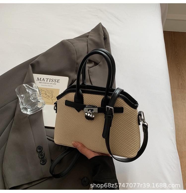 2025 new niche simple casual bucket bag women's one-shoulder crossbody bag cute retro hand-held shell bag