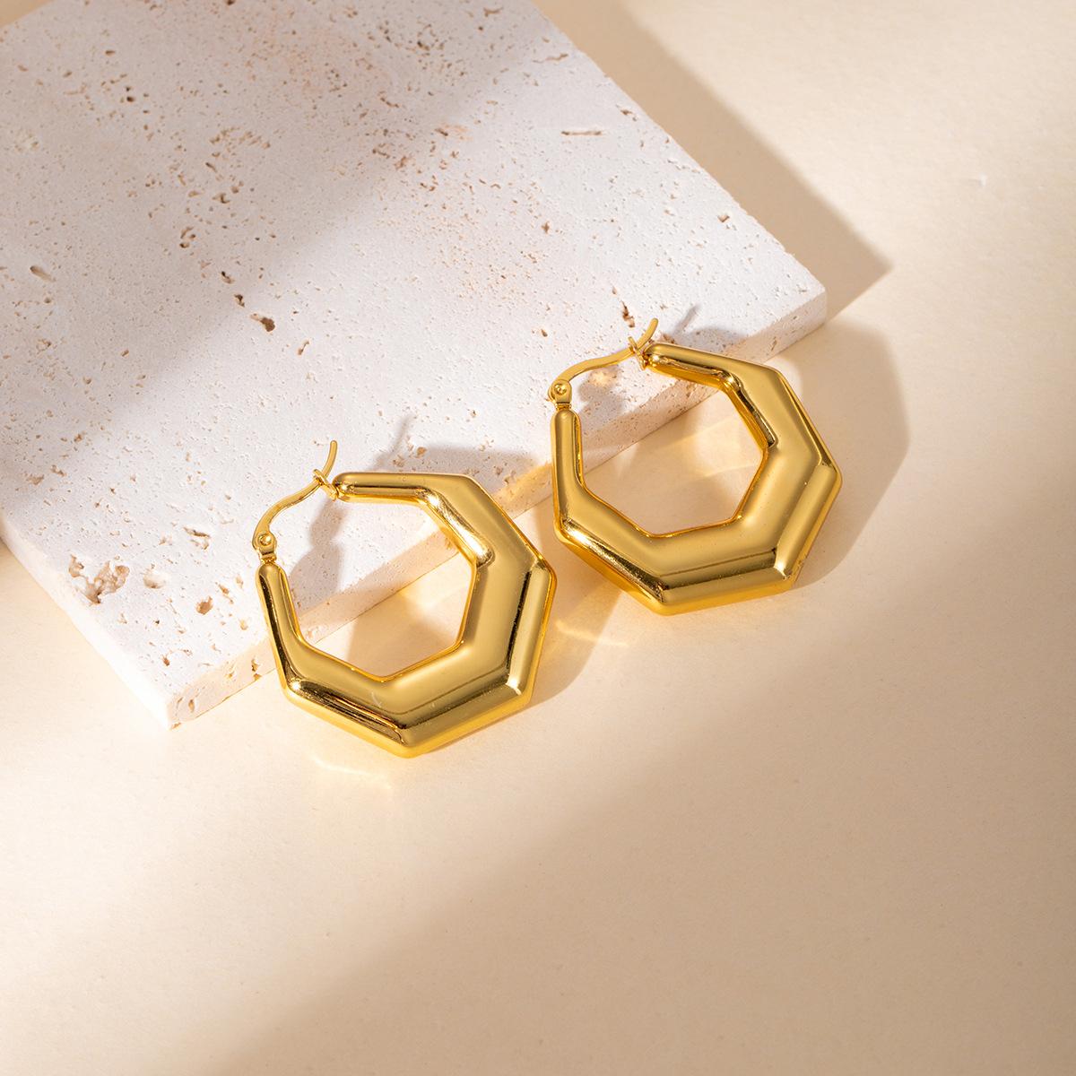 Geometric hollow C-shaped stud earrings in vintage stainless steel - unique and elegant ear accessories