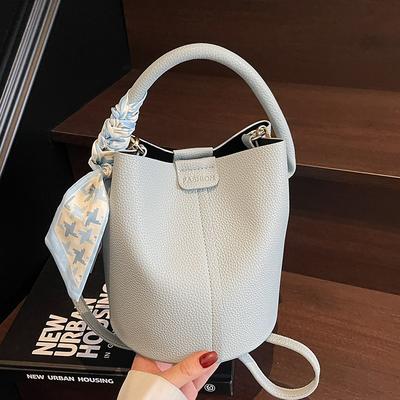 Stylish and Simple Ouruo Casual Versatile Portable Bucket Bag Women's Commuting Advanced Sense Messenger Child and Mother Bag