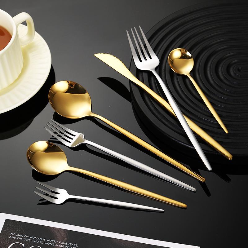 Gold-Plated Stainless Steel Cutlery Set: Includes Steak Knife, Fork, Spoon, and Knife – Four-Piece Western Style.